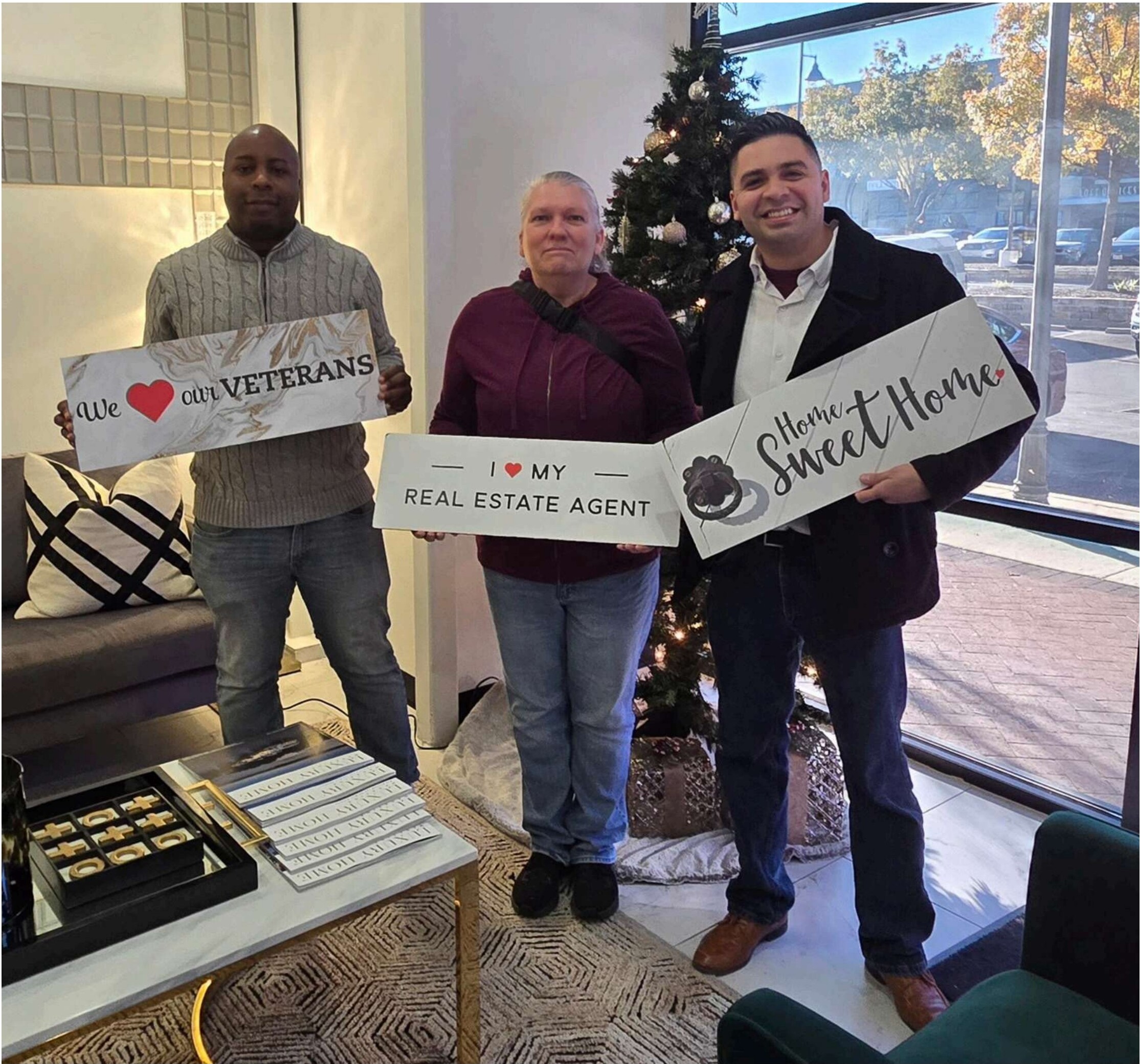 Clients celebrating their new home with their real estate agent
